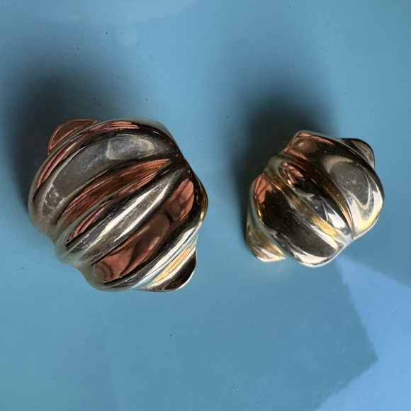 Large gold tone clip on vintage earrings